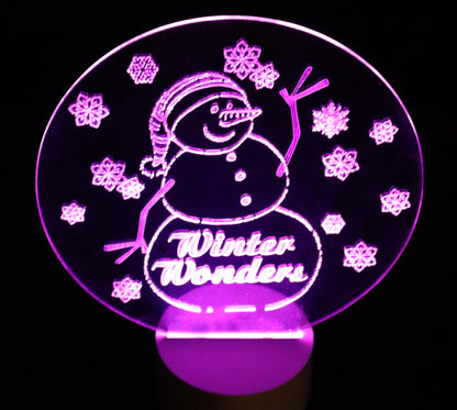 Glowing Winter Snowman- 10" tall - 8" wide - Multi-color, Multi pattern LED light base with remote control