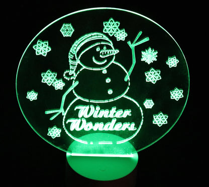 Glowing Winter Snowman- 10" tall - 8" wide - Multi-color, Multi pattern LED light base with remote control