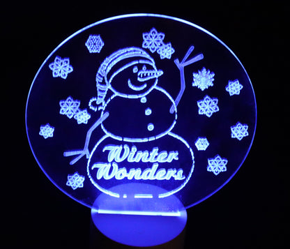 Glowing Winter Snowman- 10" tall - 8" wide - Multi-color, Multi pattern LED light base with remote control